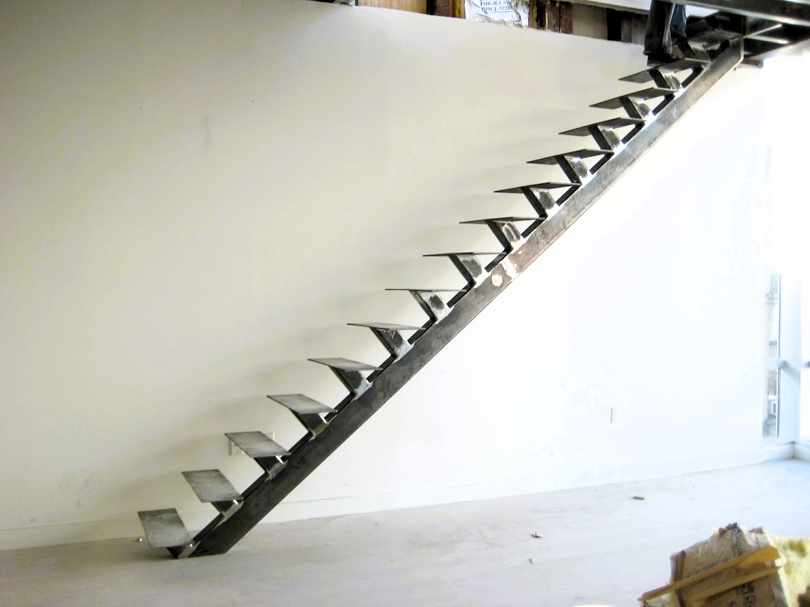 Custom dog-leg metal staircase for a home